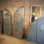 One of these shutter doors is original- guess which one!  The others are copies to replace doors that were too rusted to reuse.<br/>